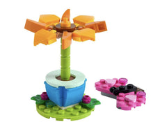 LEGO Friends garden butterfly: connectable to the flower for versatile garden-themed play.