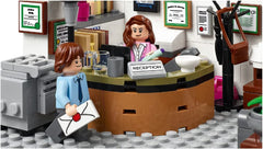 Desk islands with minifigures enable interactive dialogue and play.