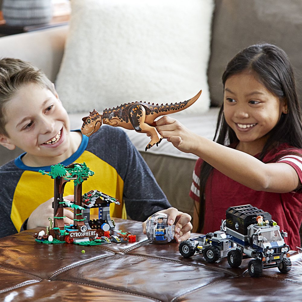 LEGO Jurassic World Gyrosphere launcher enables dynamic pretend adventures.