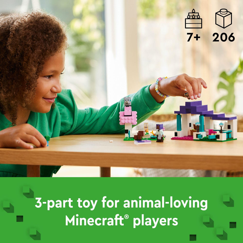 LEGO Minecraft Animal Sanctuary feeding chest shows bone, carrot, and wheat for role-play feeding.