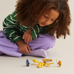 LEGO NINJAGO Green dragon power element in the dragon's mouth during play.