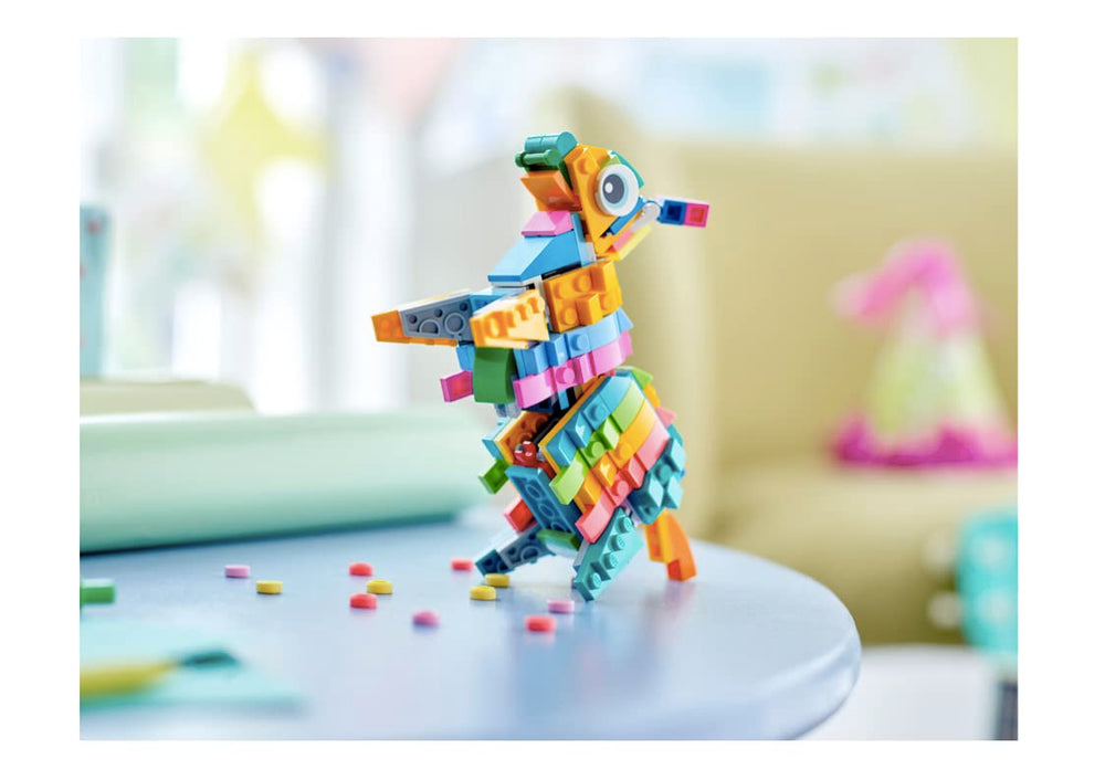 LEGO Pinata bottom candy-drop reveals mini bricks during a surprise