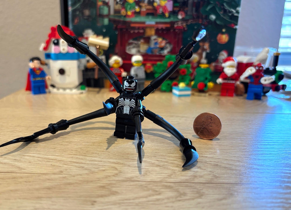 LEGO Spider-Man Venom tile close-up showing authentic Minifigureland detail.
