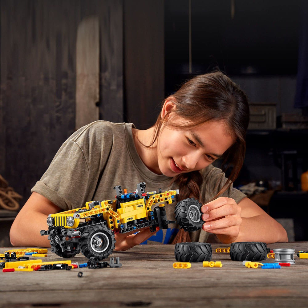 LEGO Technic Jeep Wrangler 42122 opening doors invites hands-on exploration
