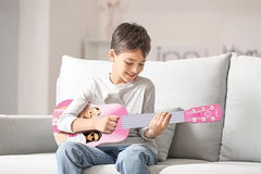 Lexibook Barbie logo on guitar body for brand recognition