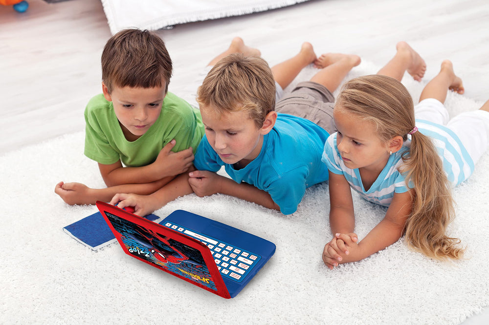 LEXiBOOK Spider-Man child using laptop to learn through games.