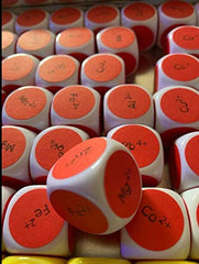 Lianshi blank dice held in hand, portable learning tool.