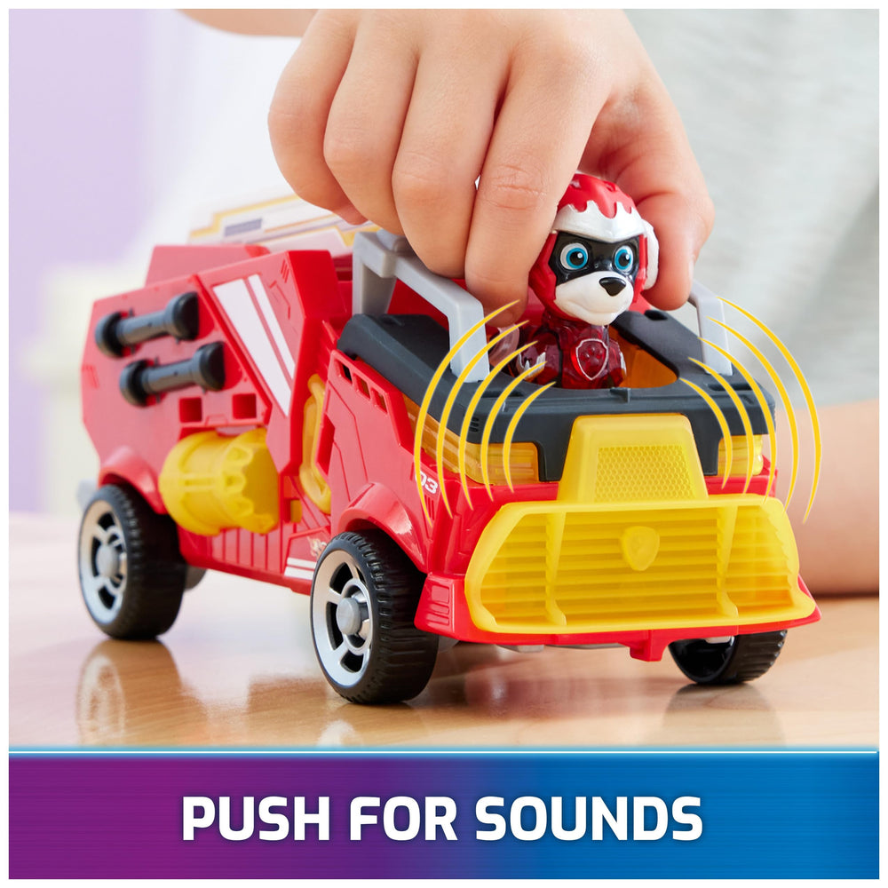 Vehicle lights and sounds activate when Marshall clips into the seat for action