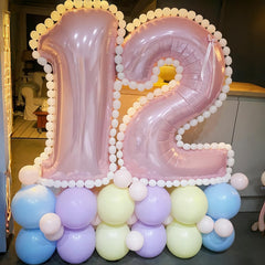 Lingqiang pastel pink 40-inch foil number 7 balloon helps create cohesive color schemes