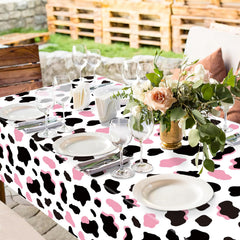 LINHAXM pink cow print tablecloth neatly folded for storage after an event