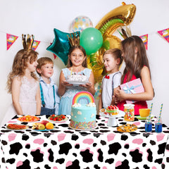 LINHAXM pink cow print tablecloth used as party decorations for a cowgirl theme