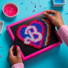 Lite-Brite Barbie Edition snap-on grid helps your art shine brighter and faster