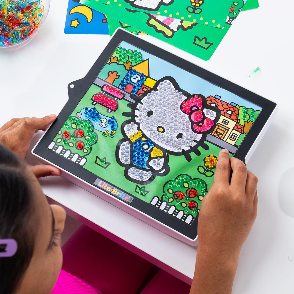 Lite-Brite ColorPOP pull-out easel—easy home display of your glow art.