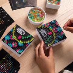 Bright colorful pegs from Lite-Brite Mini-X Connect for playful glow art.