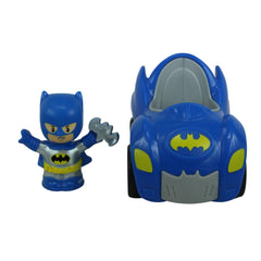 Toddler hands holding Batman figure from Little People DC Super Friends