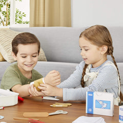Little Tikes First Aid Kit arm sling enables imaginative care stories for pretend injuries.