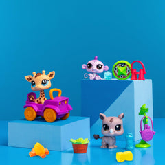 Collector card and virtual code unlock Littlest Pet Shop surprises.