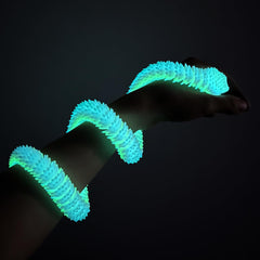 Lohoee luminous snake model shines under purple light for collectibles.