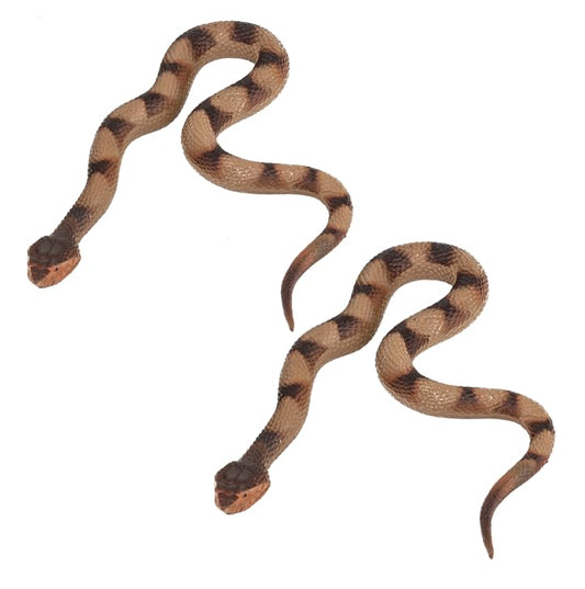 Lohoee realistic snake toy on a branch to deter birds in your garden.