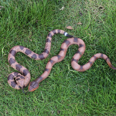Lohoee snake garden prop helps deter small pests naturally.