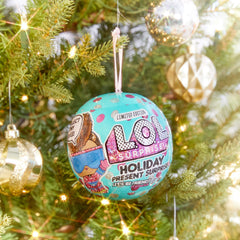 Seven surprises included: secret message, bottle, accessory, tiny elf, outfit, shoes, doll.