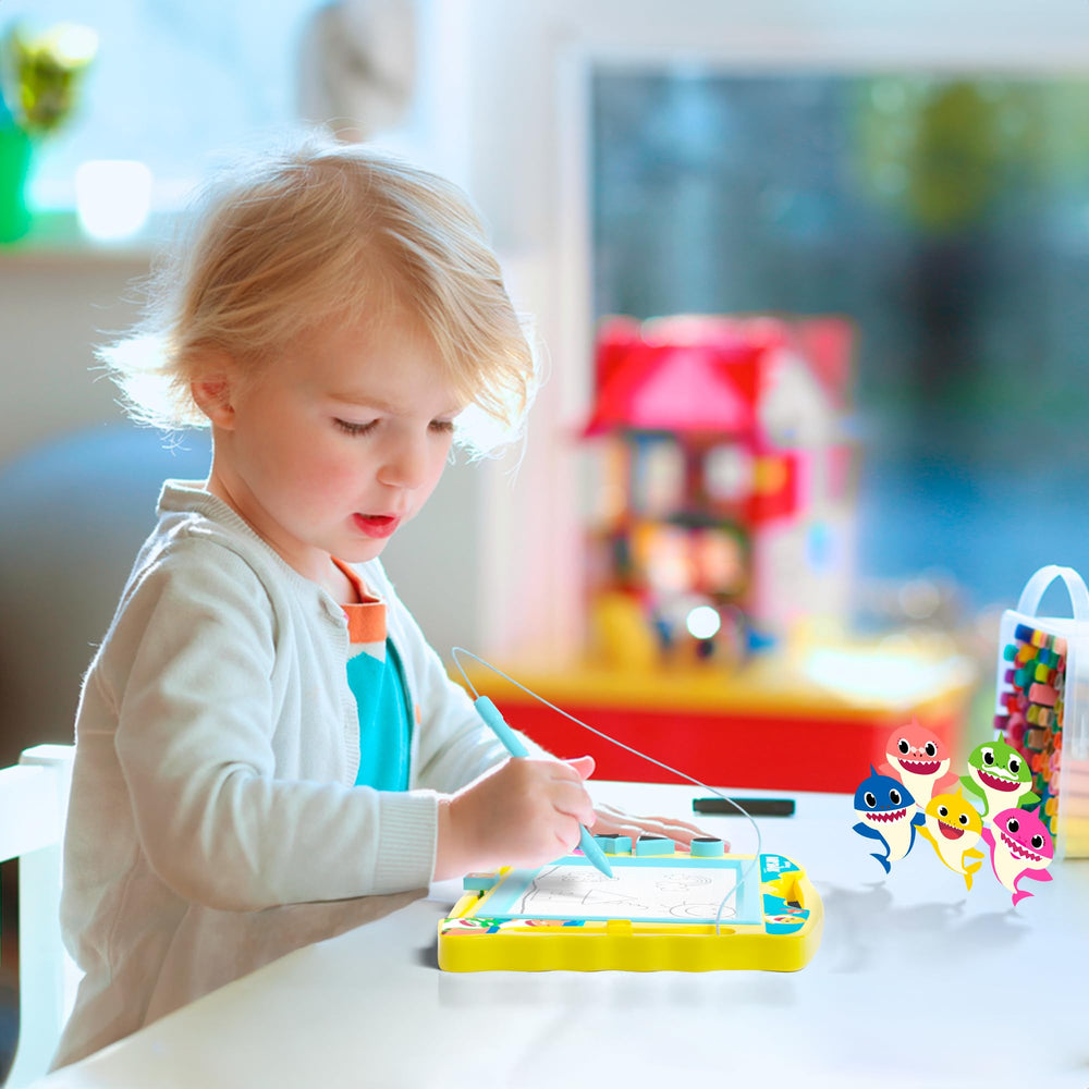 Lollipop Baby Shark drawing board in use by a kid for creative drawing
