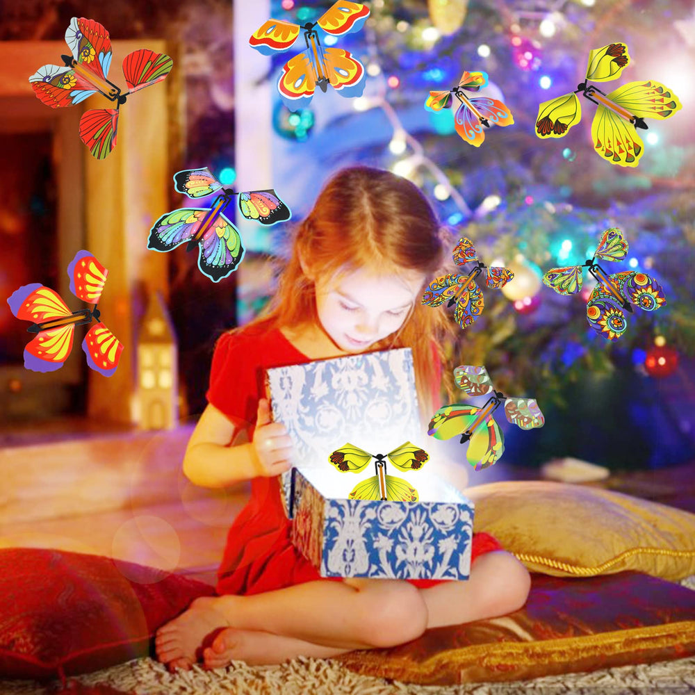LOMIMOS wind-up butterflies enhance wedding invitations and greeting cards.