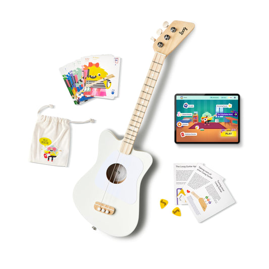 Loog Mini acoustic kids guitar with 3 strings supports early learning.