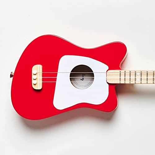 Loog Mini nylon strings produce warm classical tones ideal for first chords.