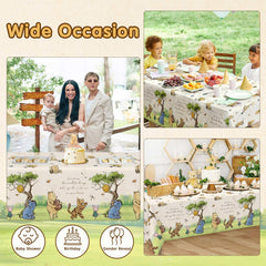 Lopeastar Pooh bear birthday tablecloth set for a gender reveal setup.