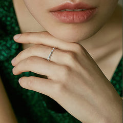 LOVECOM gold-plated spinner ring on hand demonstrates smooth rotation.