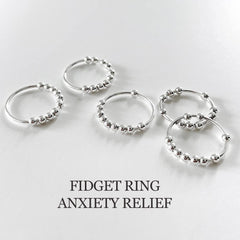LOVECOM sterling silver beads ring rotation close-up for tactile focus.
