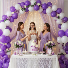 LovesTown purple balloon arch setup for elegant event backdrops.
