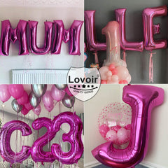 Lovoir hot pink X balloon featured in stylish birthday setup.