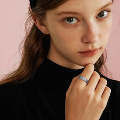 LuckyAmor Just Breathe ring in stainless steel texture for durable, hypoallergenic wear.