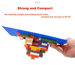 Children building with LVHERO baseplates to create imaginary worlds