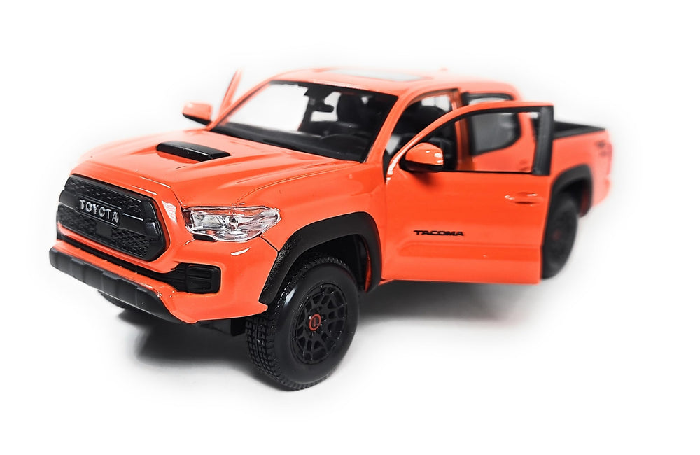 Maisto Tacoma TRD Pro die-cast metal body offers weight and durability for collectors.