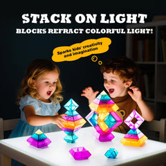 Blocks on a light table reveal color mixing and light transmission by MAKE KIDS SMILE BUBBLE FUN.