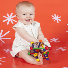 Manhattan Toy Skwish Classic 6 non-toxic finish highlights safe teething surfaces.