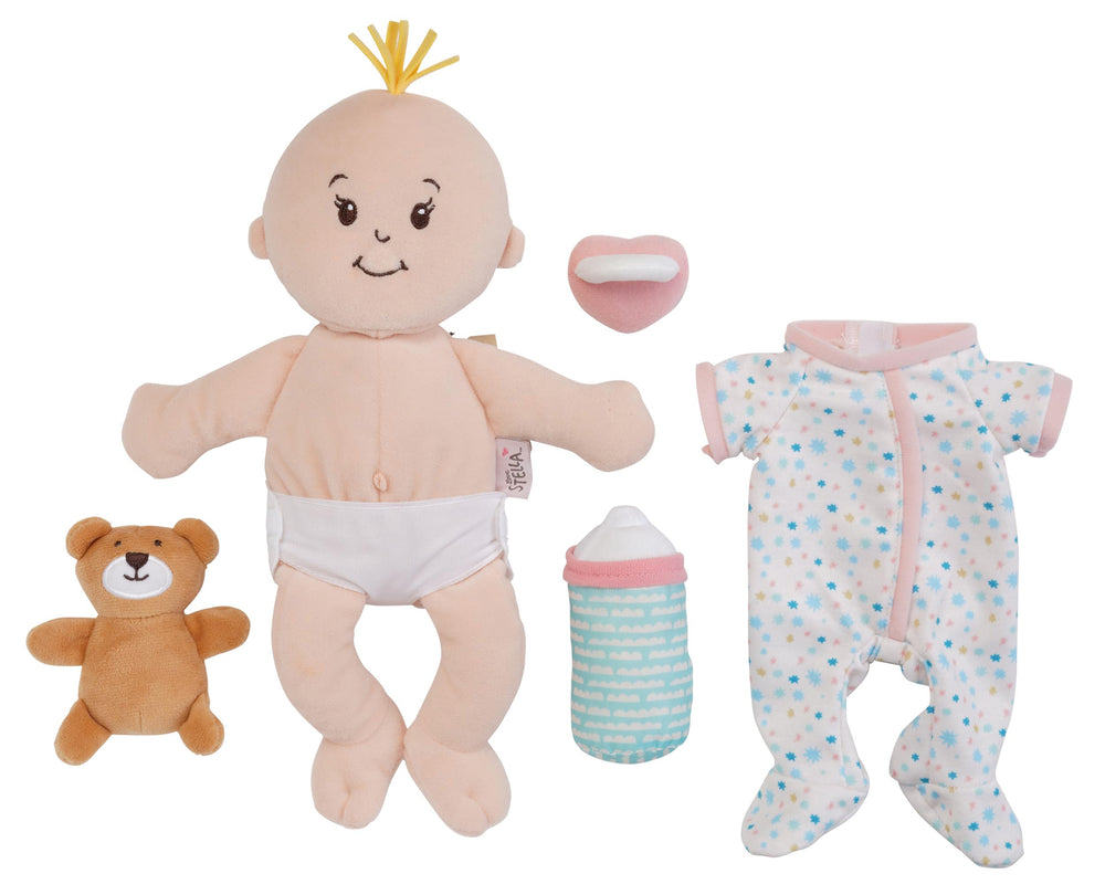 Manhattan Toy Wee Baby Stella magnetic pacifier supports lifelike nurturing moments.