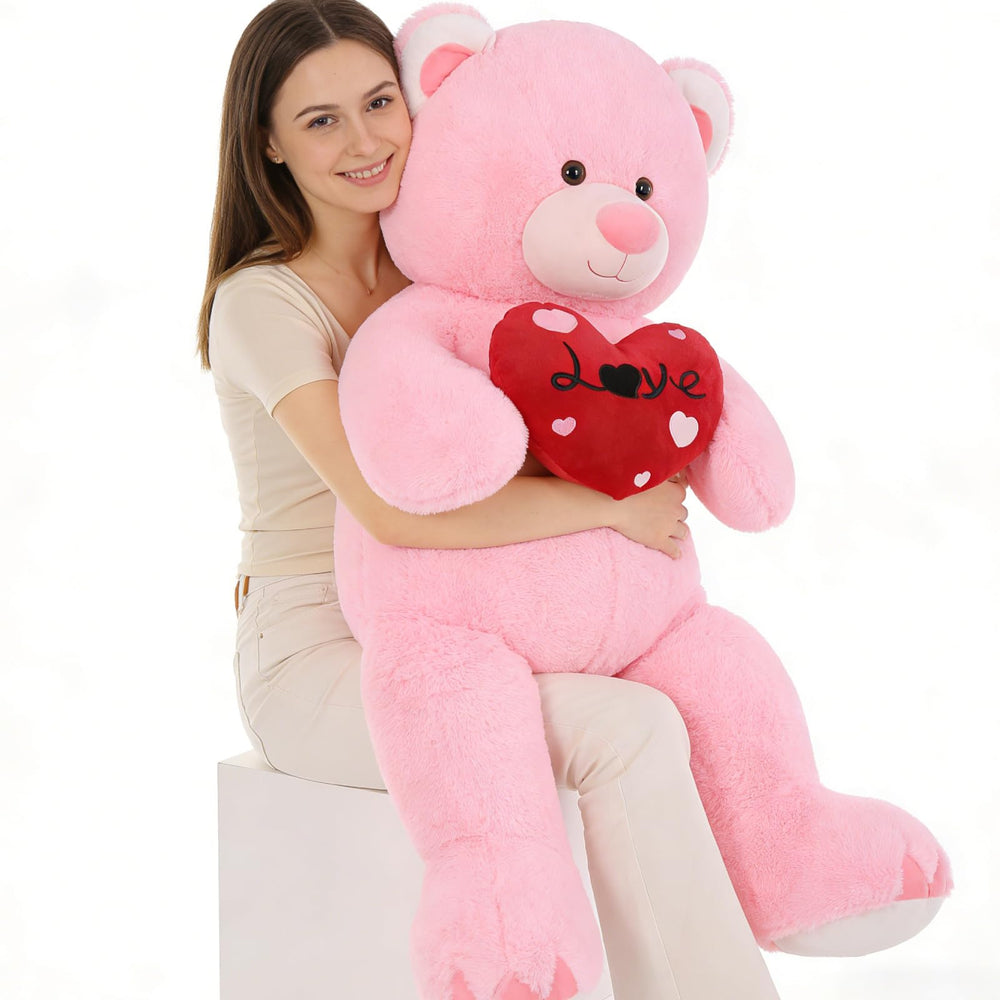 MaoGoLan 51-inch pink teddy bear in full view with red heart for hugs and comfort.