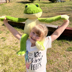 MaoGoLan large frog plush draped over curtains for decorative charm.