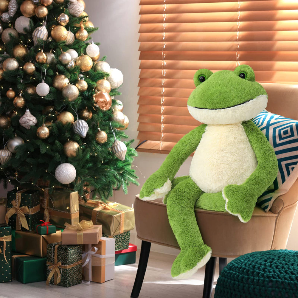 MaoGoLan green frog stuffed animal on bed as birthday gift idea.
