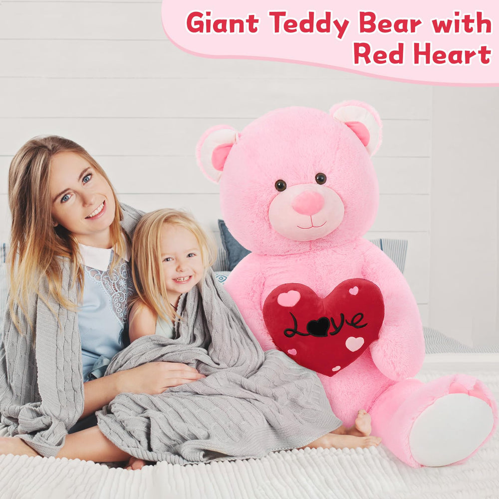 MaoGoLan teddy bear with heart pillow close-up, a charming gift idea.