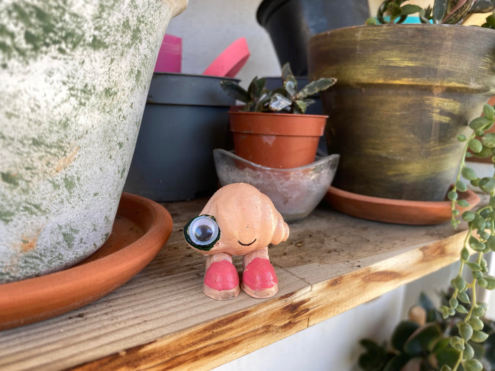 Marcel the Shell with Shoes On life-size figure presented as a thoughtful gift idea for fans.