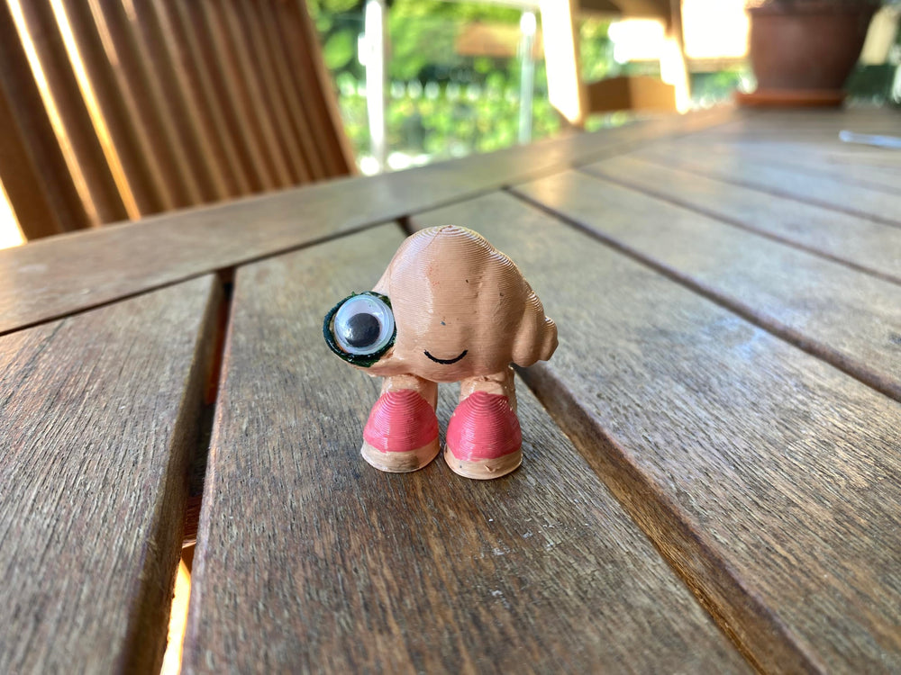 Marcel the Shell with Shoes On life-size figure 3D printed PLA sculpture captures vibrant features for unique home decor.