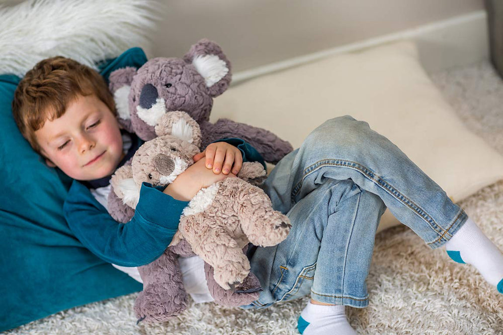 Mary Meyer Putty Koala Beige weighted bum enhances comforting, lifelike heft.