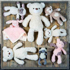 Putty Lamb's weighted bum and feet provide a grounded snuggle