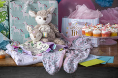 Mary Meyer Taggies Flora Fawn blanket pattern offers visual interest.
