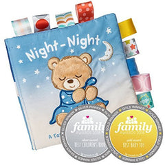 Mary Meyer Taggies Starry Night Teddy Soft Book in baby's hands during storytime